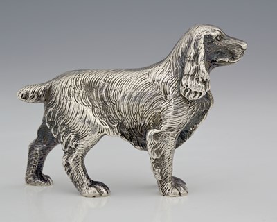 Lot 192 - An Elizabeth II cast silver model of a spaniel,...