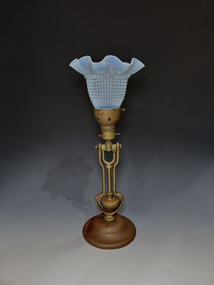 Lot 644 - A gimbal brass table or wall lamp with...