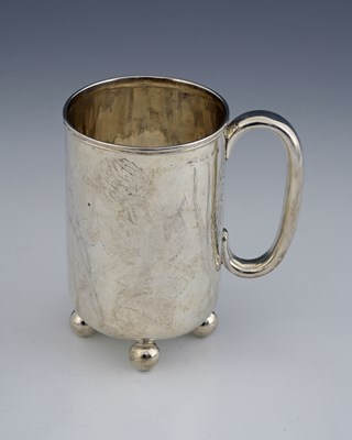 Lot 219 - A Victorian silver mug, of cylindrical form,...