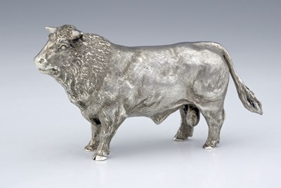 Lot 195 - An Elizabeth II silver cast model of a bull,...