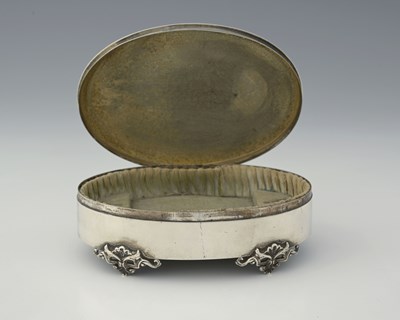 Lot 133 - A George V silver jewellery box, of oval form,...