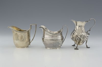 Lot 233 - Three silver cream or milk jugs, 18th and 19th...