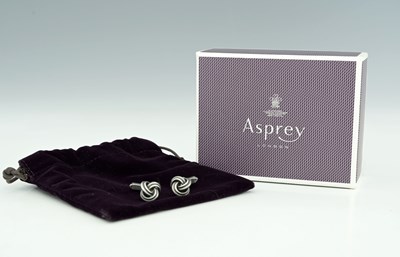 Lot 297 - Asprey, a pair of boxed silver cufflinks, with...