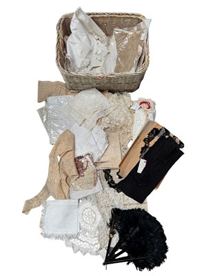 Lot 272 - A basket of antique and vintage clothing,...