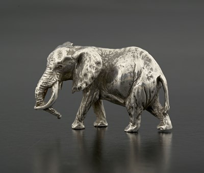 Lot 185 - A cast model of an elephant, in a standing...