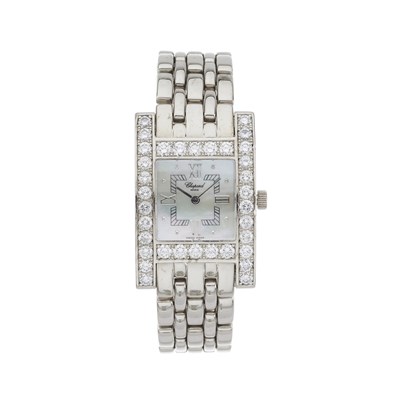 Lot 235 - Chopard, an 18ct gold diamond set Your Hour bracelet watch
