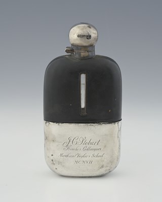 Lot 338 - An Edwardian silver and leather-mounted glass...