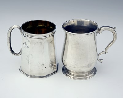 Lot 143 - Two hallmarked silver mugs, to include a...