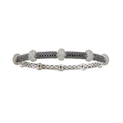 Lot 162 - An 18ct gold diamond bangle bracelet