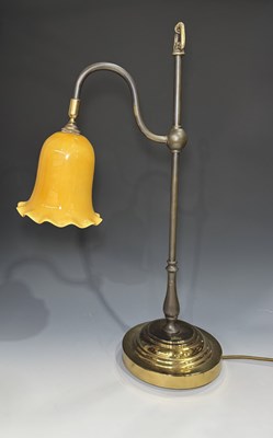Lot 659 - An early 20th century brass table lamp, the...