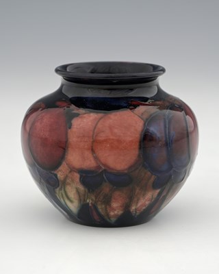 Lot 515 - William Moorcroft, a small Flambe Wisteria...