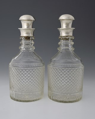 Lot 296 - A pair of twentieth-century silver-mounted...