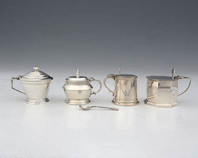 Lot 141 - Four twentieth-century silver mustard pots, to...