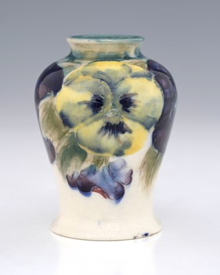 Lot 685 - William Moorcroft, a small Pansy on white vase,...