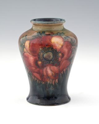 Lot 517 - William Moorcroft, a small Flambe Anemone vase,...
