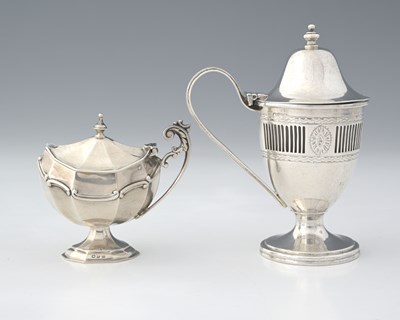 Lot 213 - Two hallmarked silver mustard pots, to include...