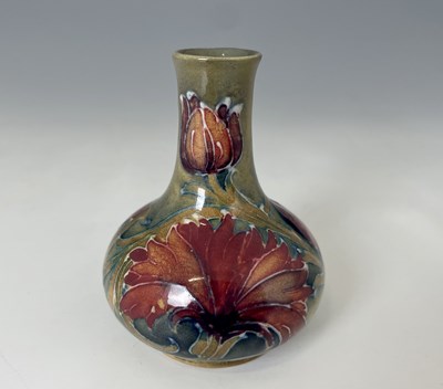 Lot 519 - William Moorcroft, a small Spanish vase, circa...