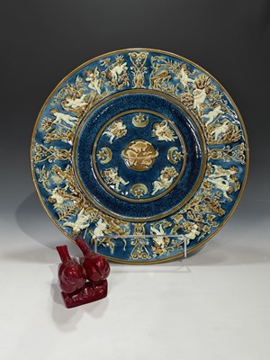 Lot 151 - A Zsolnay red flambe bird figure group...