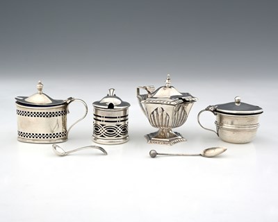 Lot 336 - Four silver mustard pots, to include a...