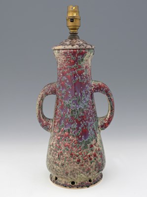 Lot 635 - Ruskin Pottery, a High Fired twin handled lamp...