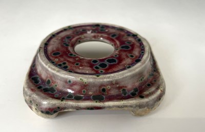 Lot 641 - Ruskin Pottery, a small High Fired vase or...