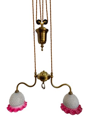 Lot 703 - An English hanging brass rise and fall...