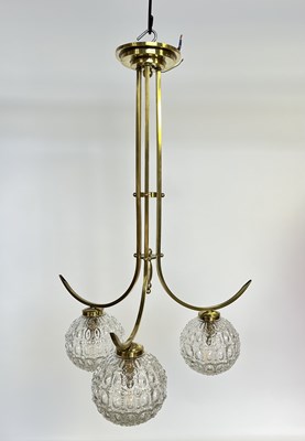 Lot 682 - A mid-century style three branch brass...