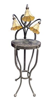 Lot 538 - An Art Nouveau style wrought iron floor...