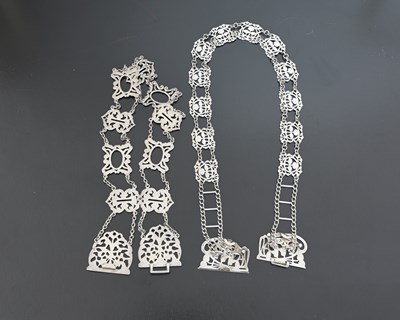 Lot 418 - Two Edwardian silver belts, including an Art...