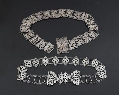 Lot 290 - Two Edwardian silver belts, to include a cast...