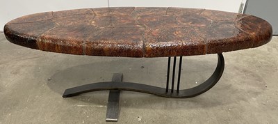 Lot 520 - A mid century elliptical coffee table, the top...