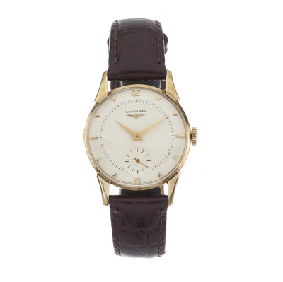 Lot 240 - Longines, a yellow metal wrist watch