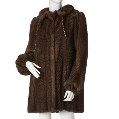 Lot 558 - A chevron-patterned ranch mink coat.