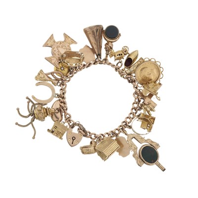 Lot 138 - A 9ct gold gold charm bracelet