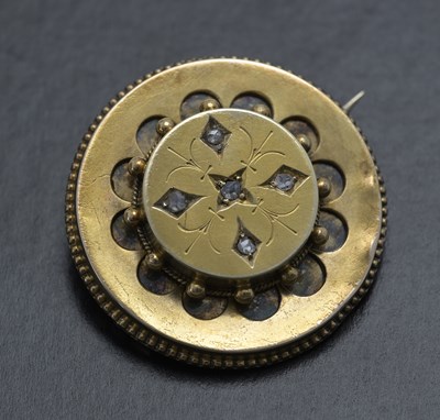 Lot 41 - A late Victorian gold rose-cut diamond target brooch