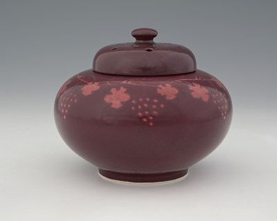 Lot 657 - Ruskin Pottery, a Souffle glazed potpourri...