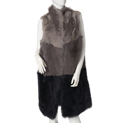 Lot 541 - Celtic & Co, a reversible Toscana shearling colour block gilet.