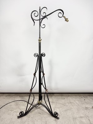 Lot 541 - A black painted wrought-iron Art Nouveau style...