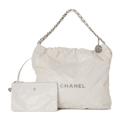 Lot 328 - Chanel, a quilted Regular 22 handbag w/ pouch.