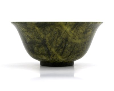 Lot 357 - A Chinese carved spinach jade bowl, rounded...