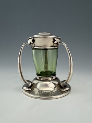 Lot 132 - An Arts and Crafts silver and glass inkwell,...