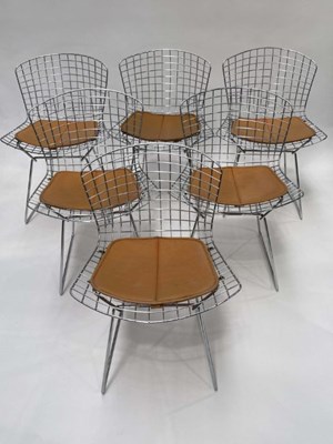 Lot 577 - After Harry Bertoia, a set of six wire side...