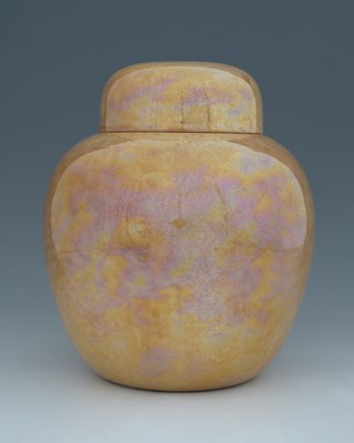 Lot 594 - Ruskin Pottery, a large orange lustre ginger...
