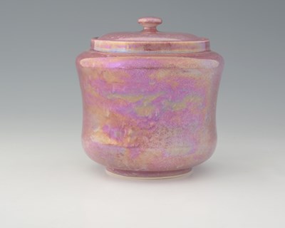 Lot 581 - Ruskin Pottery, a pink lustre jar and cover,...