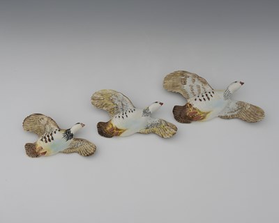 Lot 668 - Beswick, a graduated set of three flying...