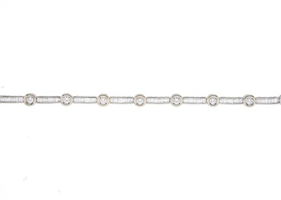 Lot 206 - An 18ct gold diamond line bracelet