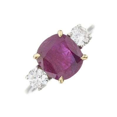 Lot 86 - A ruby and diamond three-stone ring