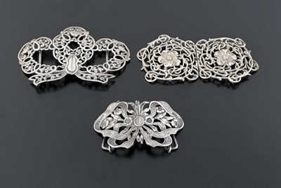 Lot 452 - Three silver buckles, one in the form of a...