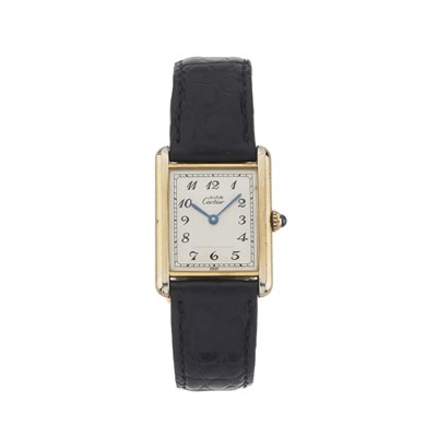 Lot 233 - Cartier, a silver-gilt Must De Cartier Tank wrist watch