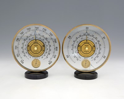 Lot 235 - Jaeger, two Art Deco glass, brass and...